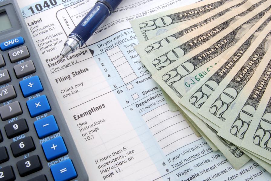 Photo of tax document and cash